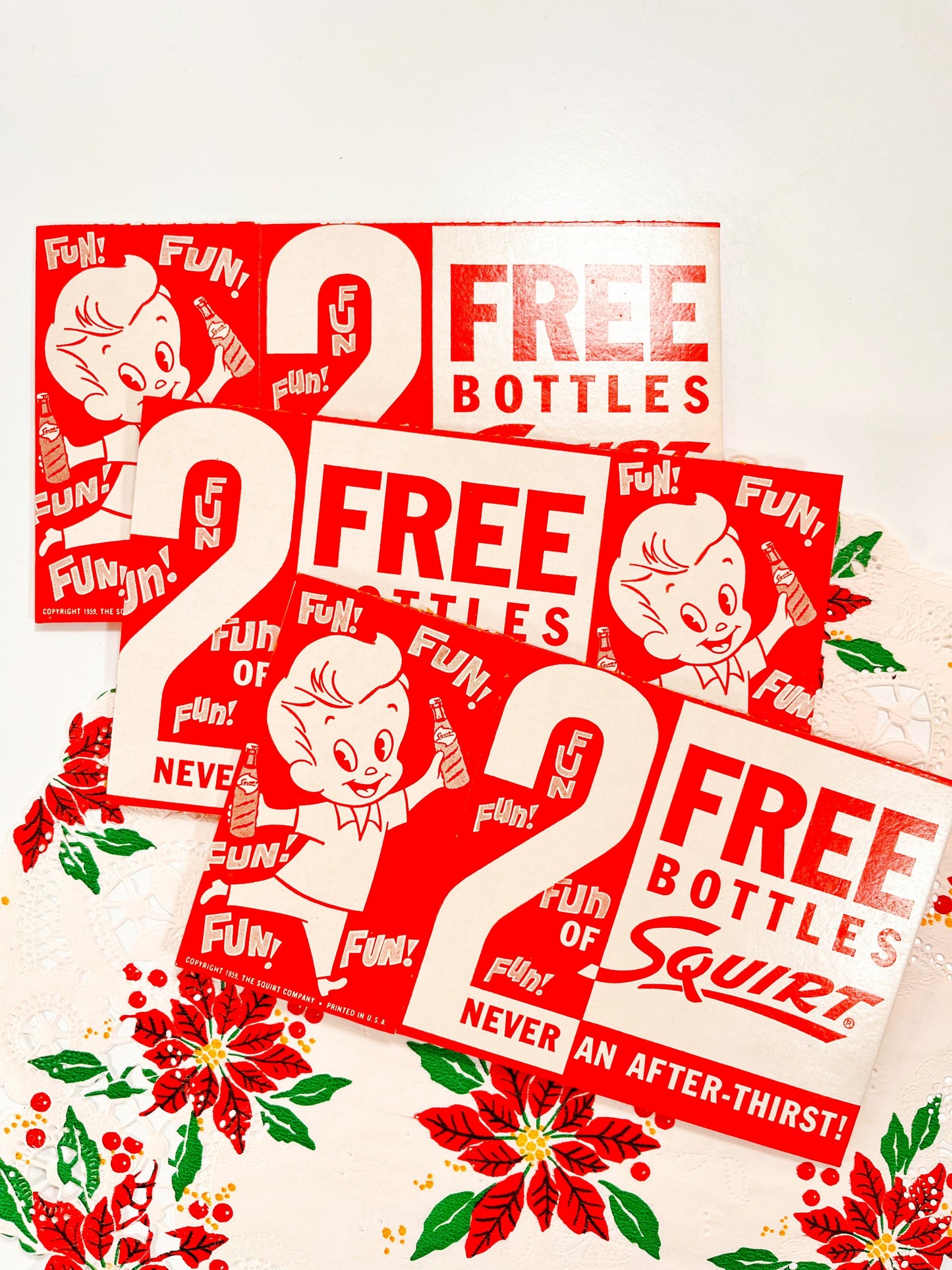 Trio of red & white vintage Squirt boxes