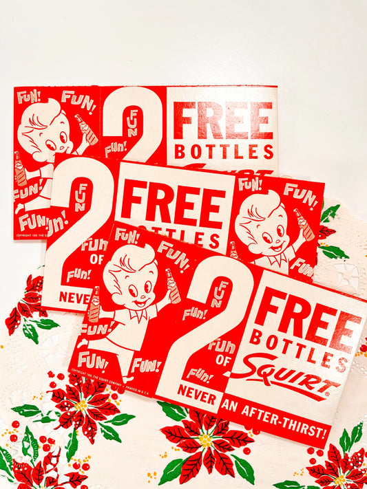 Trio of red & white vintage Squirt boxes