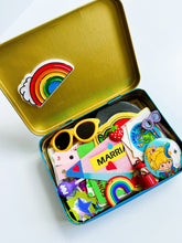 Load image into Gallery viewer, Vintage rainbow tin filled with 80’s themed ephemera & pieces