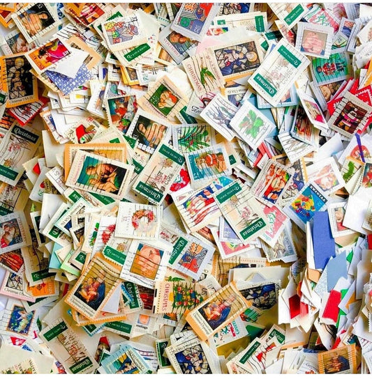 Cancelled Christmas stamps in glassine bag