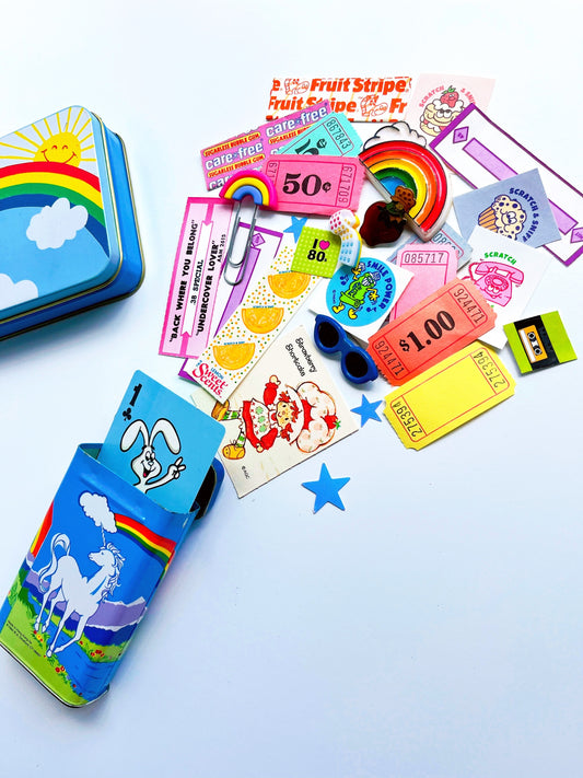 Vintage Unicorn tin filled with 80’s themed ephemera & pieces