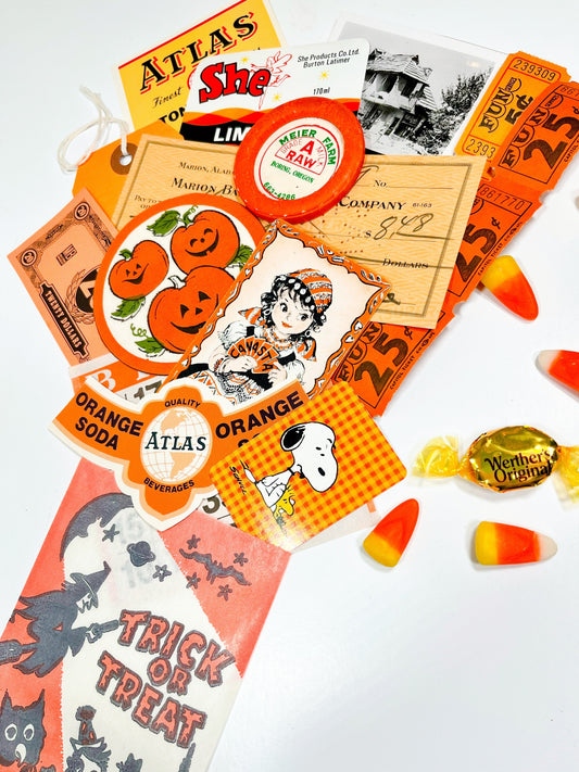Vintage trick or treat sack filled with orange & black ephemera treats!