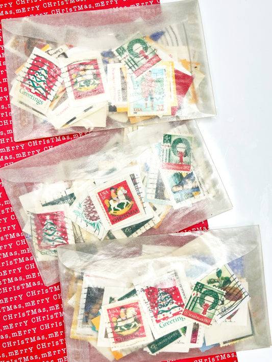 Christmas postage stamps in a glassine envelope