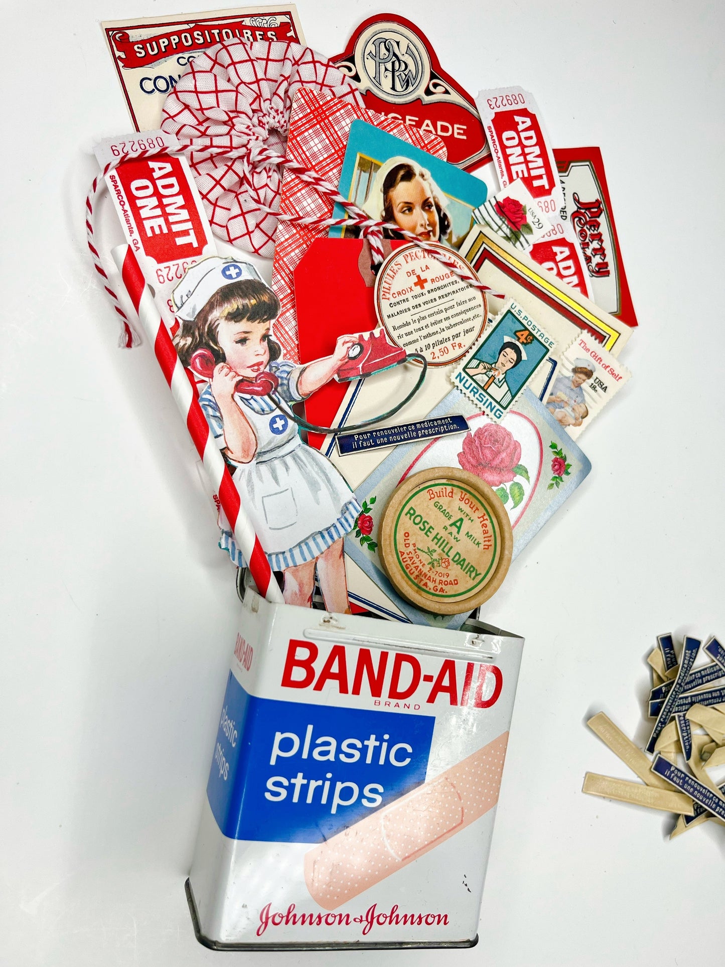 “Thank a Nurse” ephemera in a vintage Band-Aid tin