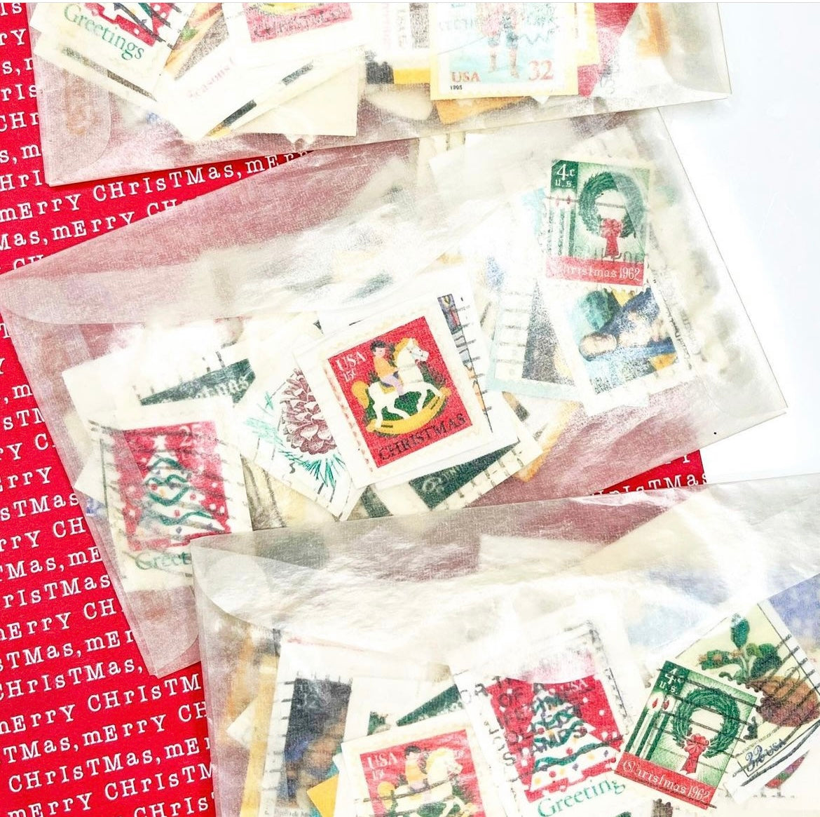 Cancelled Christmas stamps in glassine bag