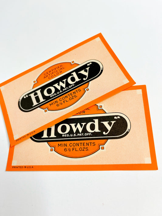 Orange & black vintage “Howdy” soda labels