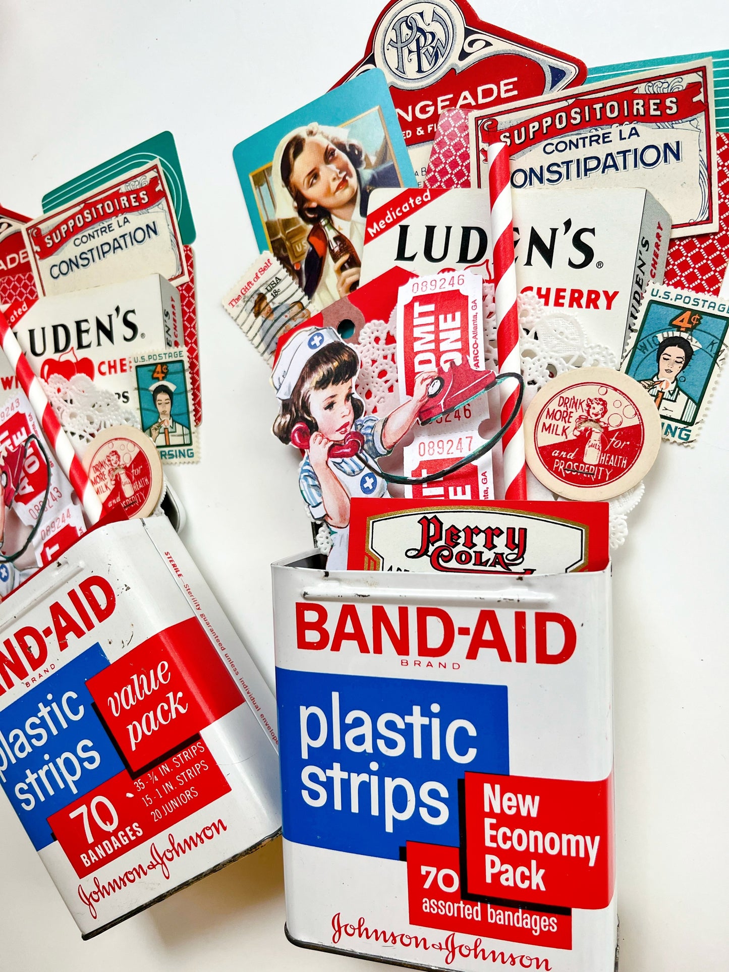 “Hello Nurse” ephemera collection in vintage Band-Aid tin